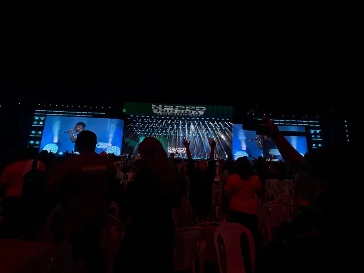 Ceejay Onyenali mixing front of house at a live event